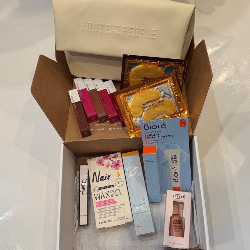 Assorted new 13 piece Beauty Lot including a beauty cosmetic bag